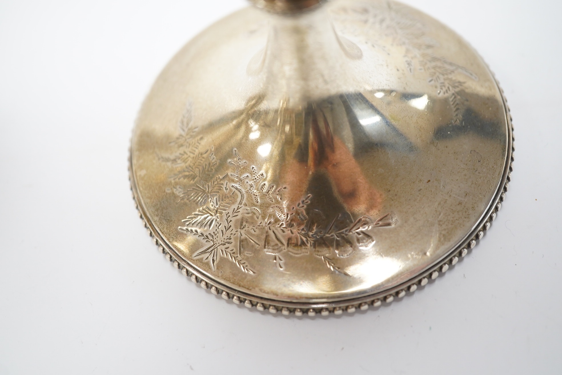 A Victorian engraved silver presentation goblet, with Masonic inscription, London, 1880, 19.5cm, together with a modern silver presentation goblet and a silver two handled presentation trophy cup and cover, 20.2oz. Condi